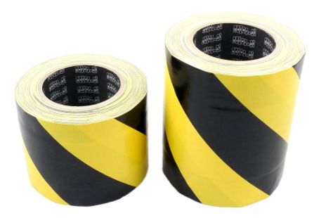 Cable cover black and yellow tunnel tape